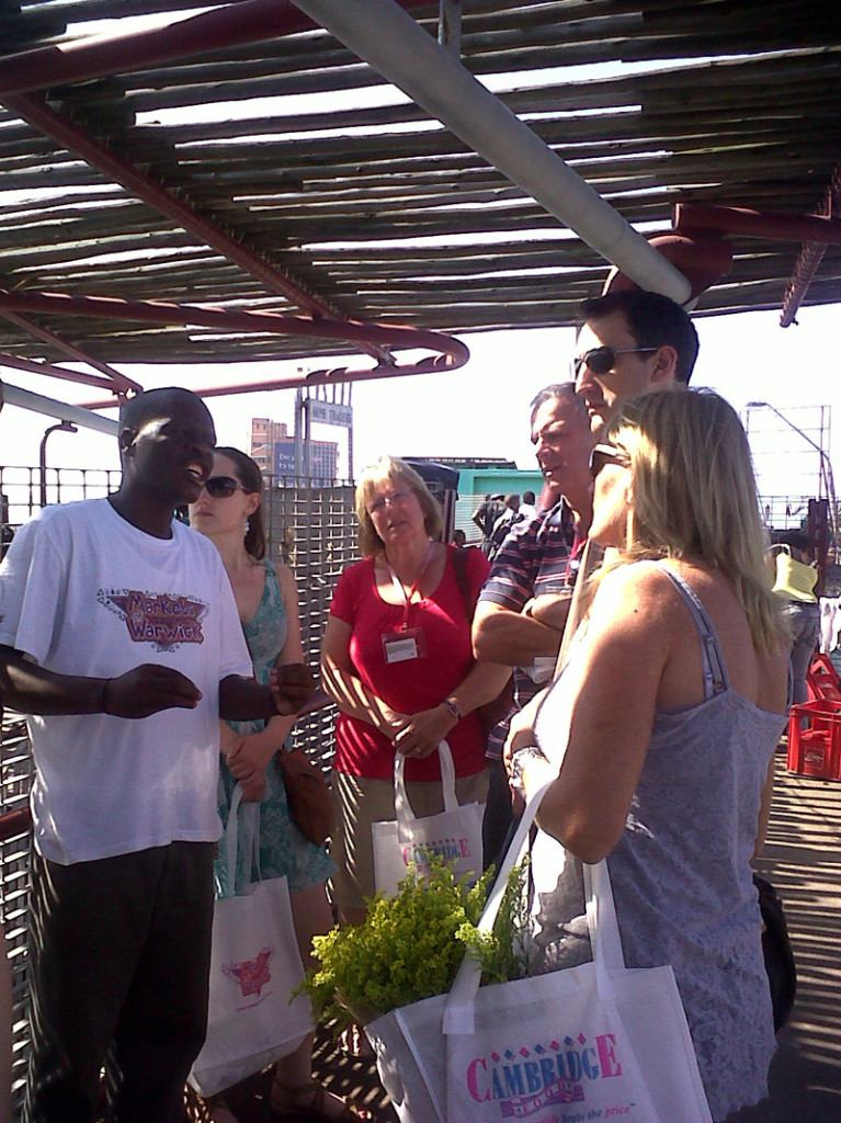 Trained Tour Guide and Informal Traders Jabulani Sambo leading a MoW Public Tour