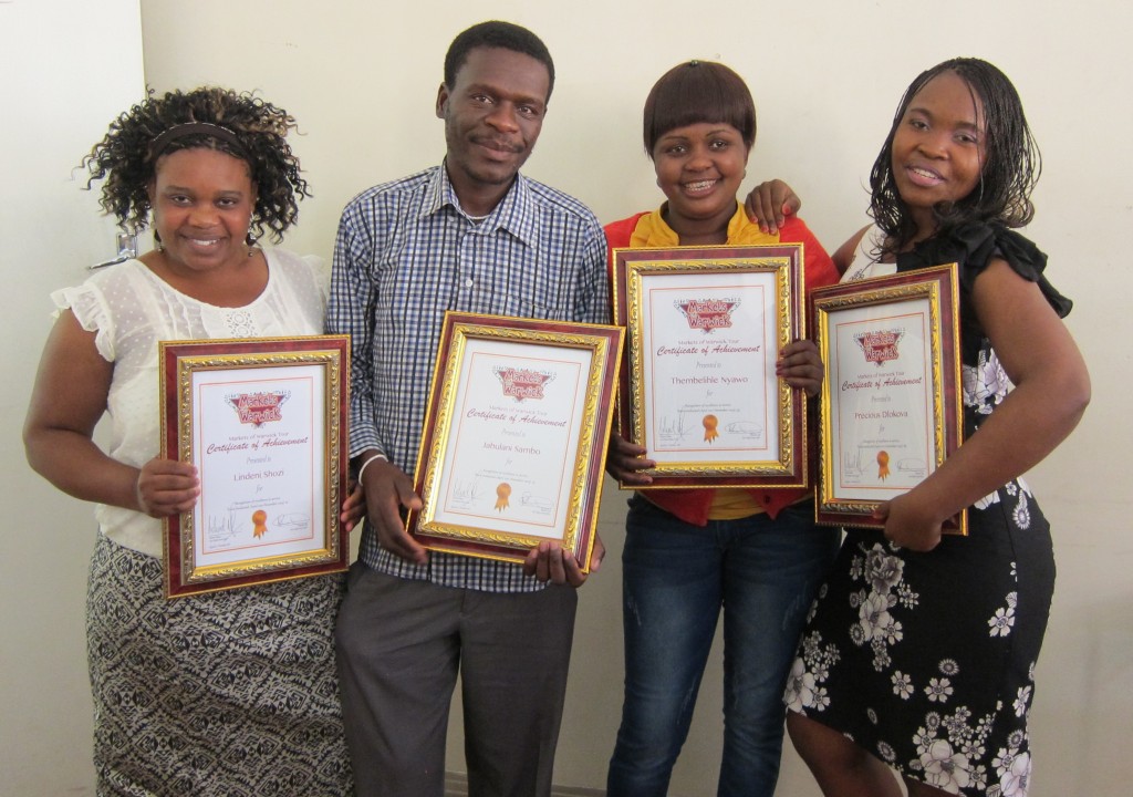 Trader Tour guides that received Certificates of Achievements. From left to right: Toe Shozi, Jabulani Sambo, Lihle Nyawo and Precious Dlokova. Photo: Phumzile Xulu.