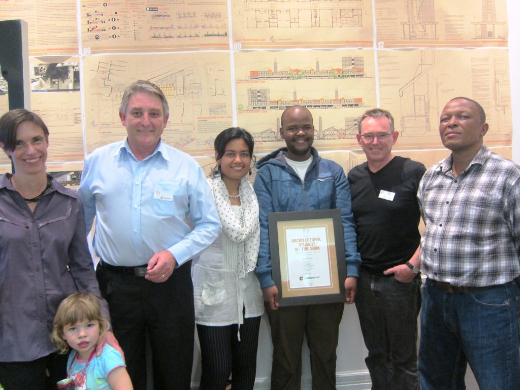 Mongezi in the centre with the award flanked by AeT staff, Corobrick and University of KwaZulu-Natal representatives. Photo: Zoe Horn.