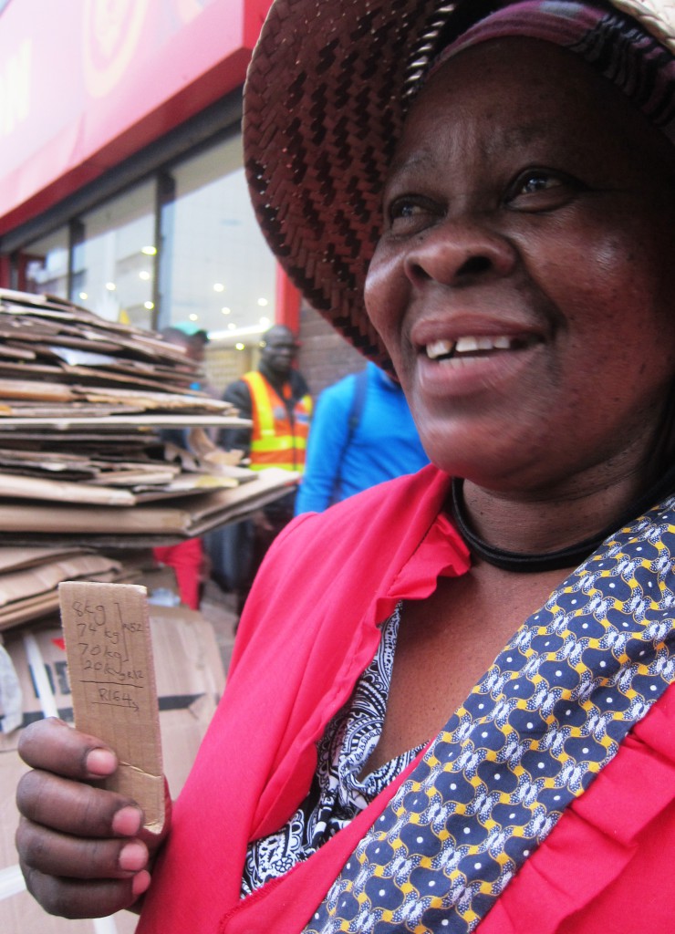 Informal Recycler showing her card which accounts the amount earned for the recyclables donated by EDIPU. Photo: Tasmi Quazi.